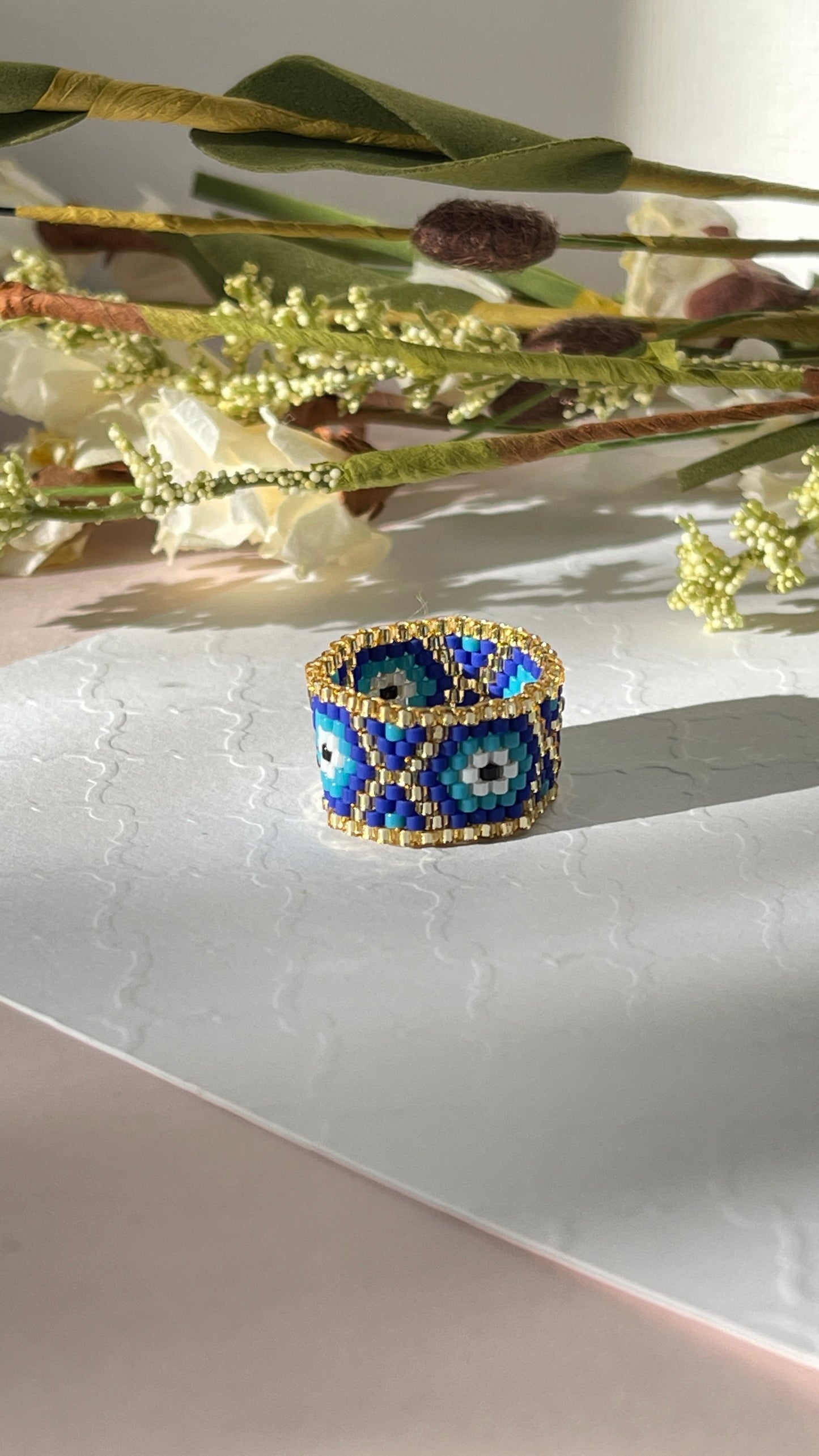 Anillo de mal de ojo azul (línea de ojos)