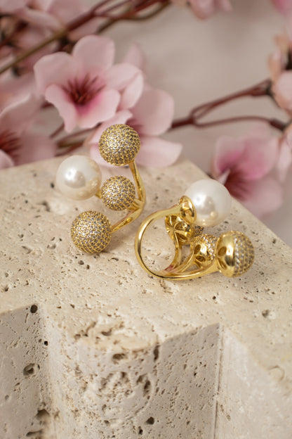 Anillo de rodio con circonitas y perla