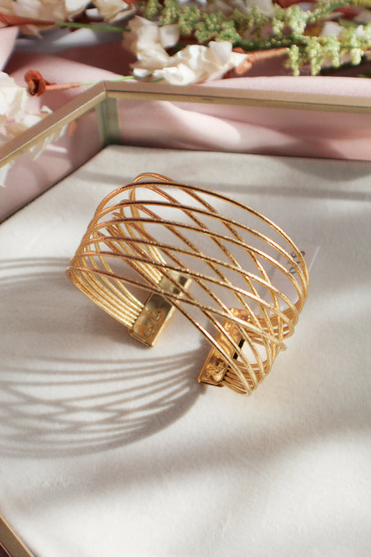 Pulsera de puño torcido