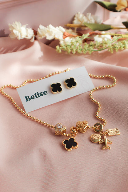 Conjunto de cadena y pendientes de trébol negro