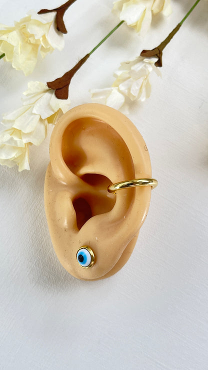 Puño para la oreja Cora
