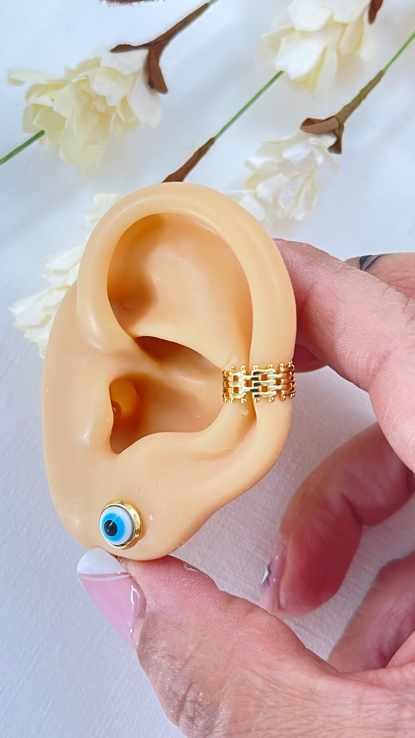 Puño para la oreja Enid